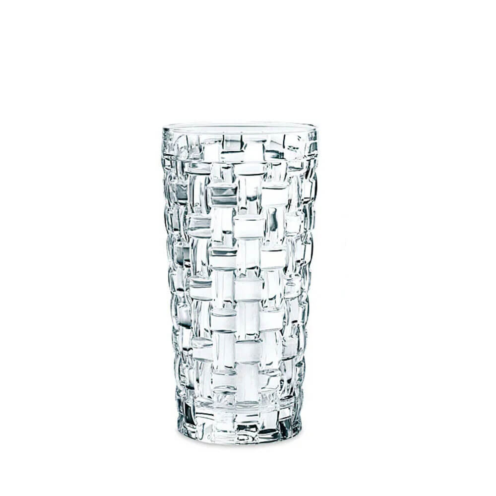 A tall, clear highball glass with a geometric lattice pattern on its surface, placed against a plain white background.