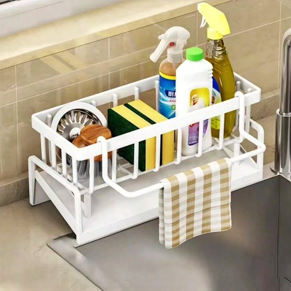 White sink caddy holds sponges and dish soap, keeping your sink area clean and organized.