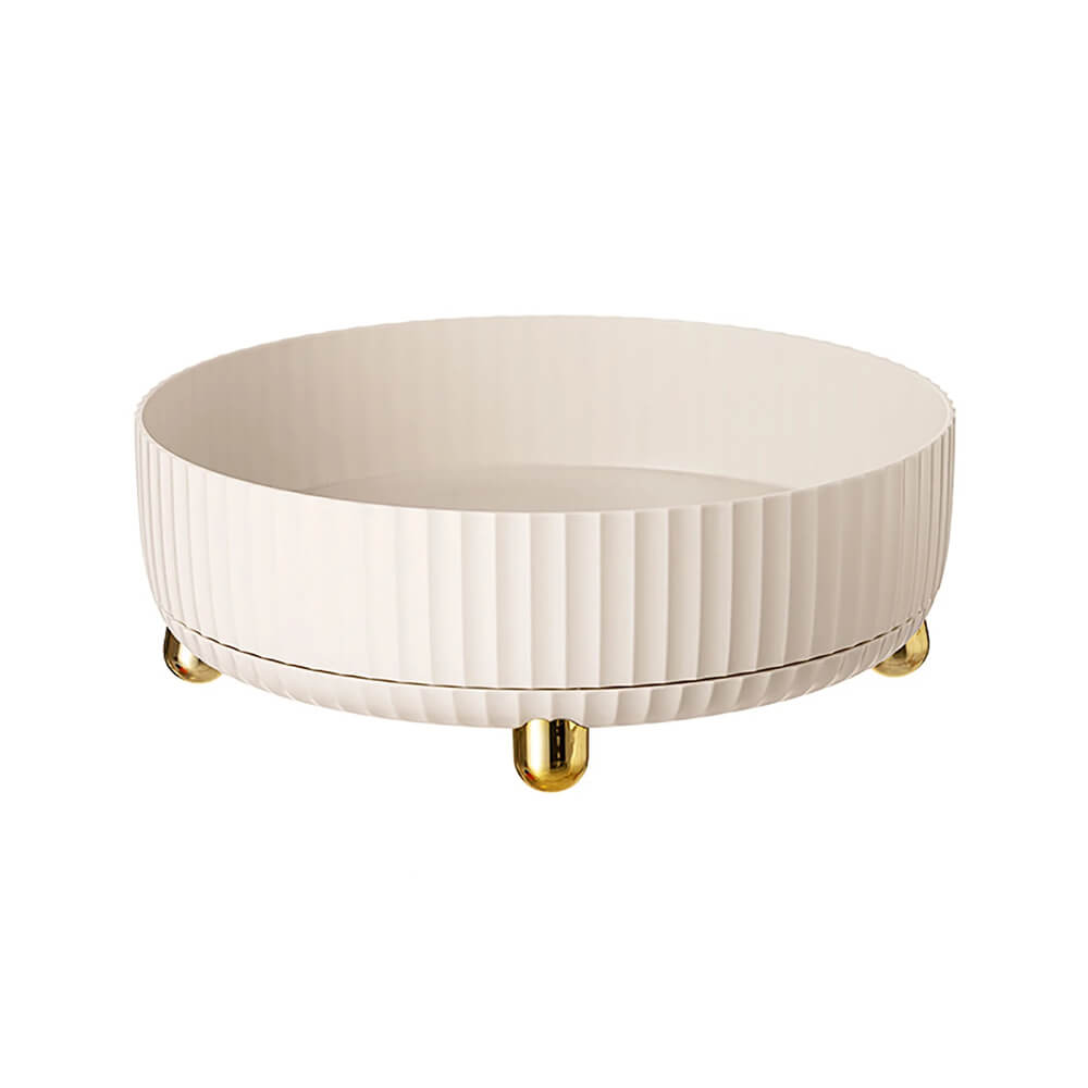 Lazy susan with cream ribbed design and gold feet, ideal for organizing spices, condiments, or small kitchen items.