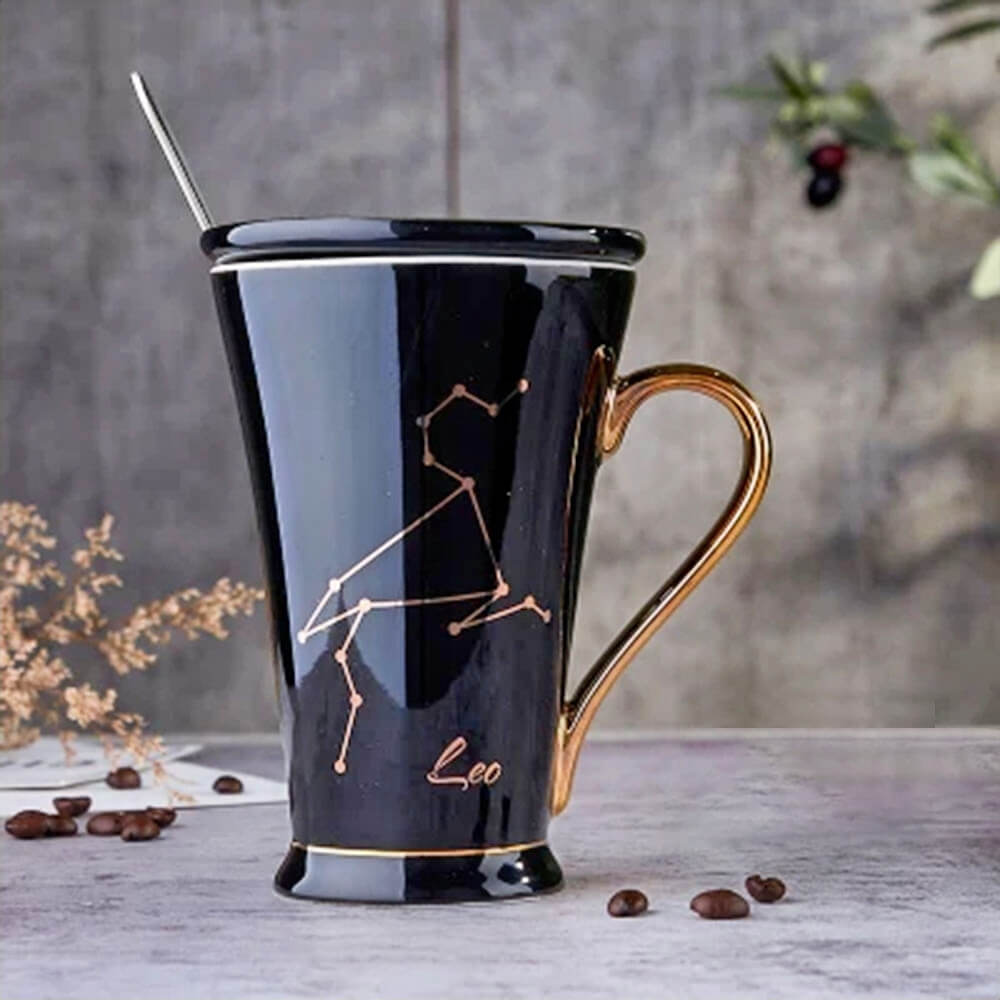 Luxurious black Leo zodiac coffee mug with a golden handle, featuring an artistic Leo constellation design and elegant lettering, perfect for astrology lovers and coffee enthusiasts.