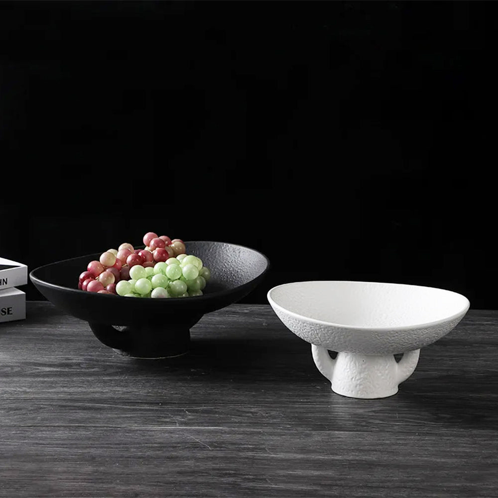 Modern black fruit bowl, white design, and black with fruits—elegant and stylish for any setting.