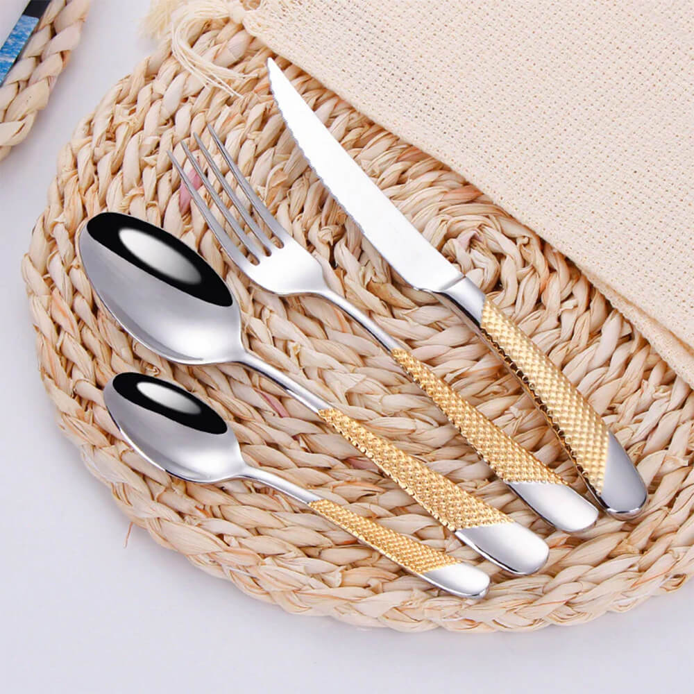 Modern stainless steel flatware set with a sleek design.