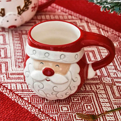 Festive mug Santa Claus design, perfect for holiday drinks, featuring a cheerful Santa face on a red background.