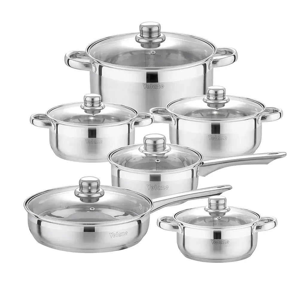 non stick stainless steel cookware sets with six pieces including pots, pans, and glass lids arranged together