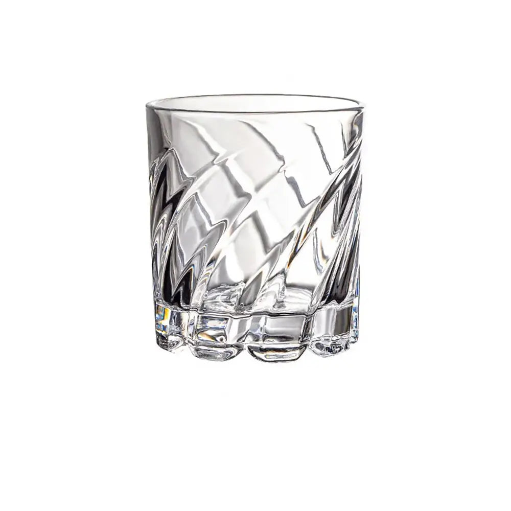 Clear old fashioned glasses with a faceted geometric texture, thick weighted base, and cylindrical shape on a light background.