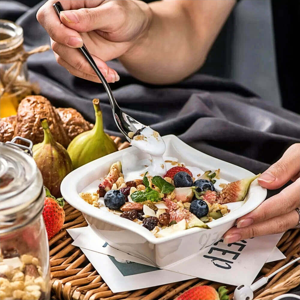 Elegant pasta serving bowl featuring a sleek square design, filled with a colorful mix of fresh fruits, nuts, and yogurt, perfect for serving pasta, salads, or desserts with style.&quot;