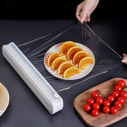 Plastic cling wrap dispenser in use, smoothly wrapping food for fresh and easy storage.