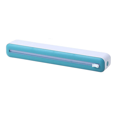 Plastic cling wrap dispenser in blue and white with sliding cutter, perfect for neatly slicing and storing food wrap in the kitchen.