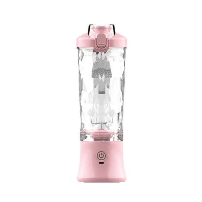 portable smoothie blender in pink with clear textured cup and power button base shown against a plain white background.