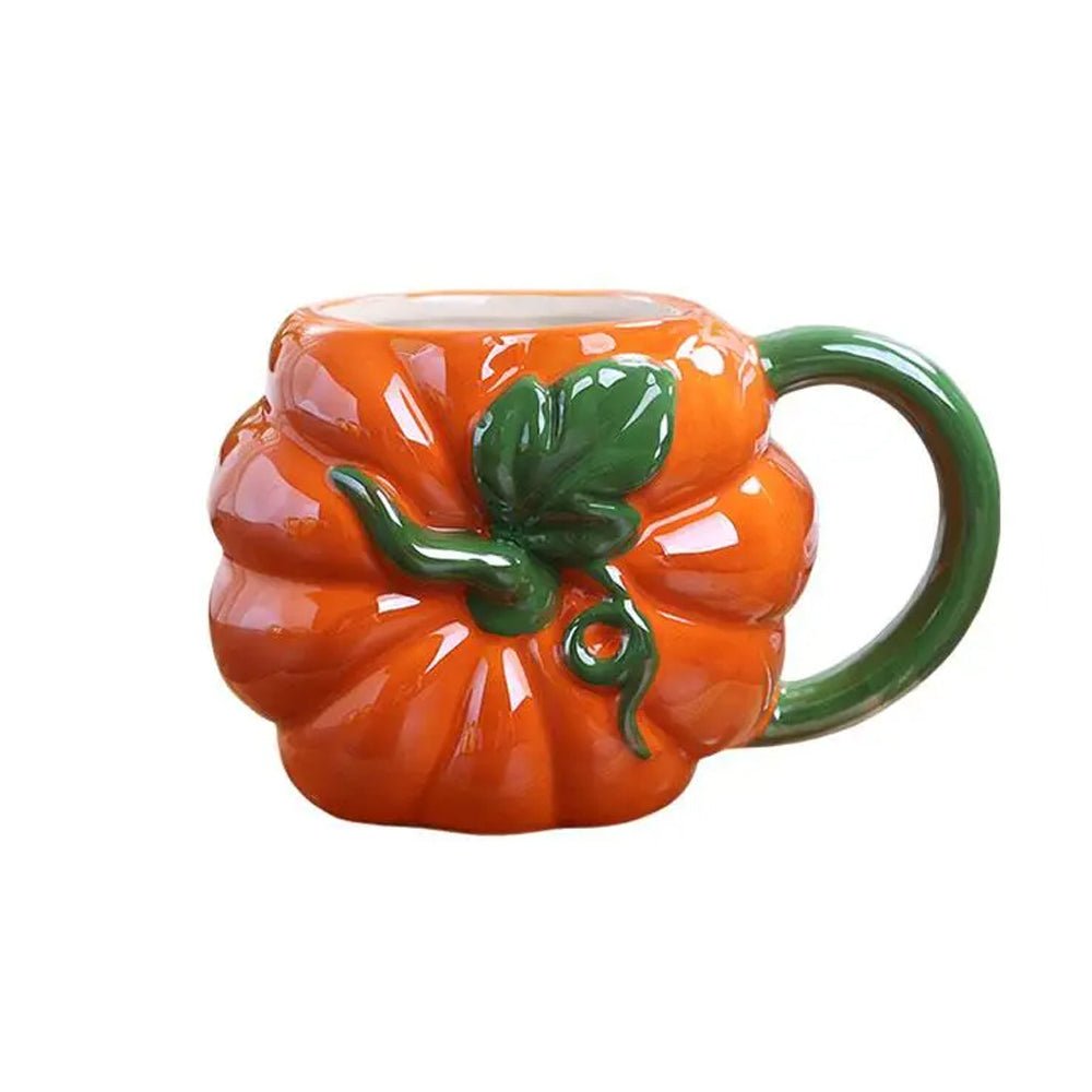 A vibrant pumpkin-shaped coffee mug with a detailed design, ergonomic handle, and premium ceramic finish.