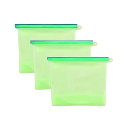 Three green reusable silicone bags with sliding seals, neatly arranged in a row on a white background.