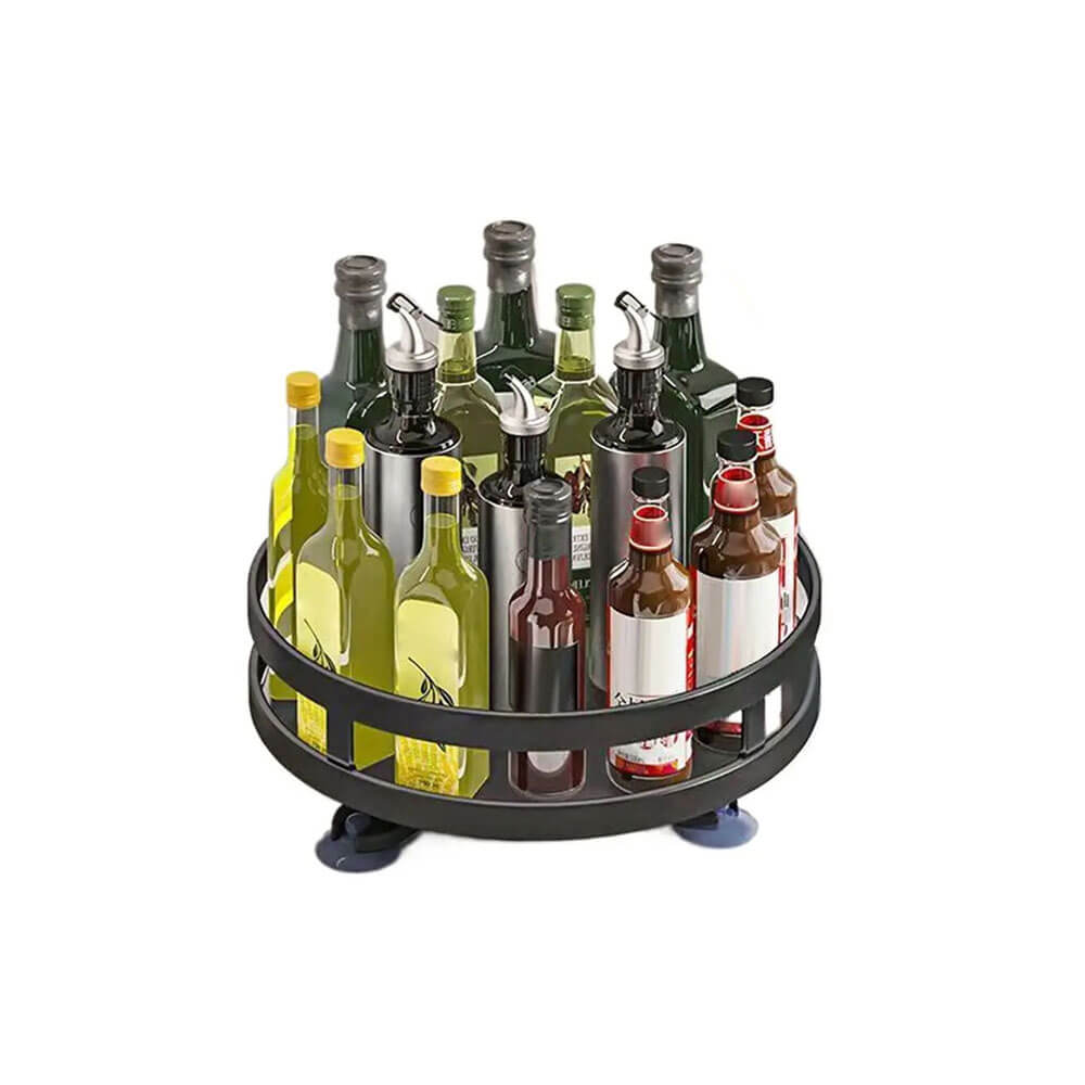 A rotating spice rack organizer with multiple bottles of oil, sauces, and condiments neatly stored on a countertop organizer.