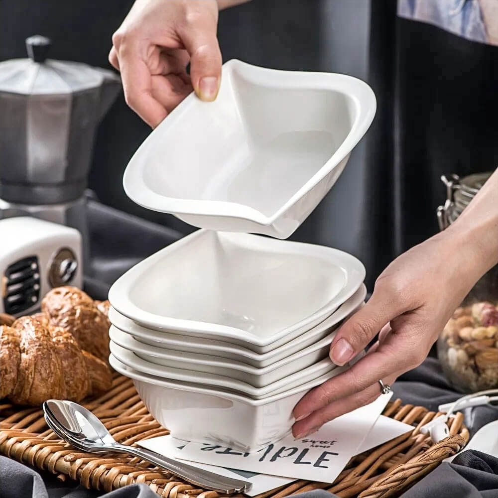 Set of stackable salad serving bowls with a modern square design, perfect for presenting fresh salads, fruits, or side dishes at gatherings and meals.