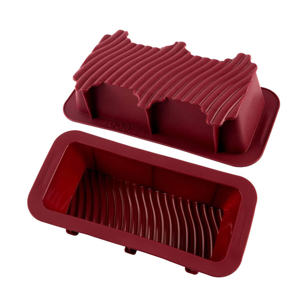 A two-piece silicone loaf pan set in a deep burgundy color. The pan features a ribbed interior surface and a matching lid with a wavy ribbed design, designed for shaping and easy removal of baked goods.