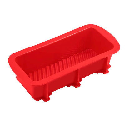 A bright red silicone bread pan with a ribbed interior surface and a sturdy rectangular shape, perfect for baking bread or loaf-shaped recipes. This image highlights one of the silicone bread pans designed for even baking and easy release.