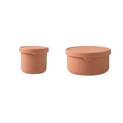 Two terracotta silicone containers for food in small and large sizes, perfect for reusable, leakproof, and eco-friendly storage.