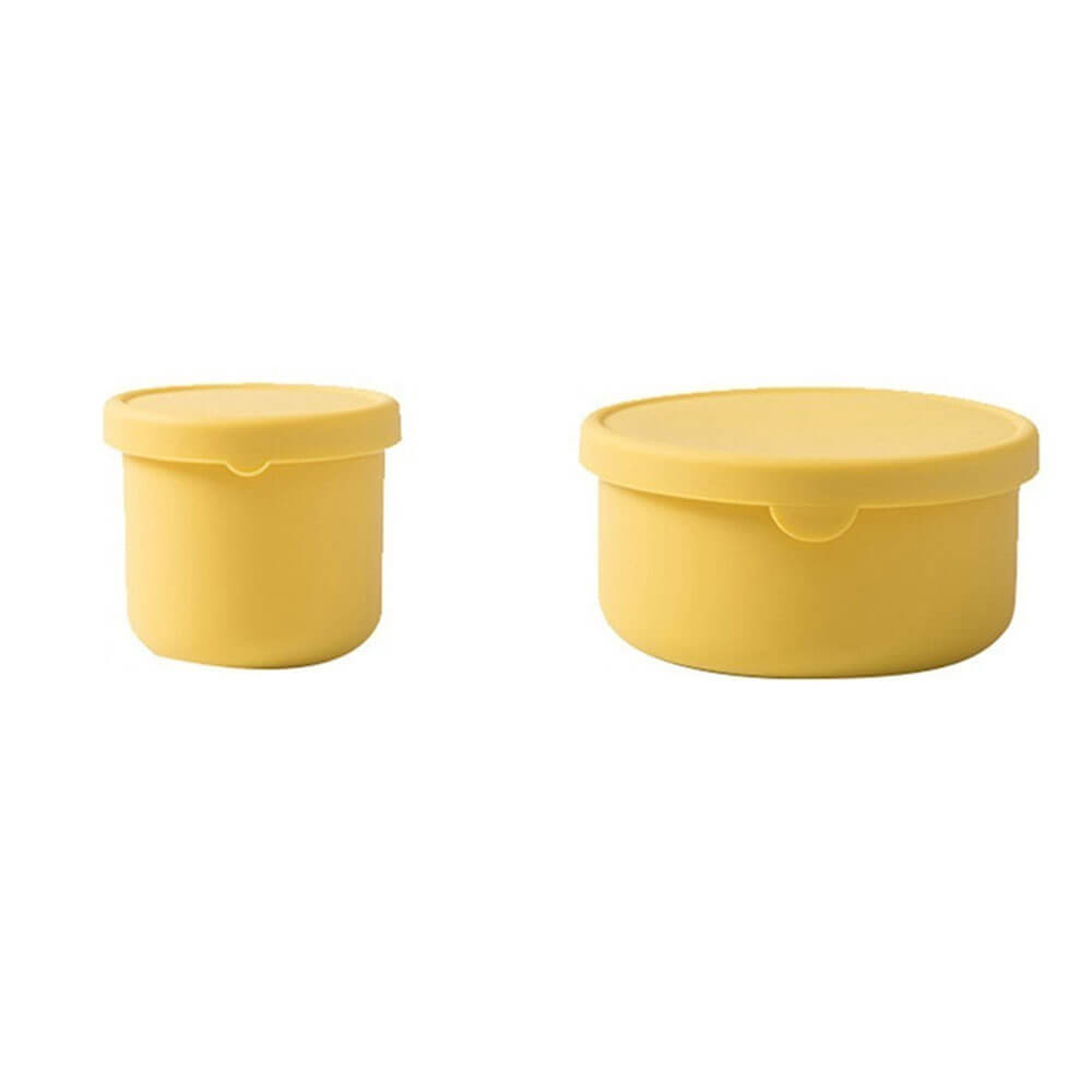 Two yellow silicone containers for freezer use, in small and large sizes, ideal for storing meals, snacks, or leftovers safely.