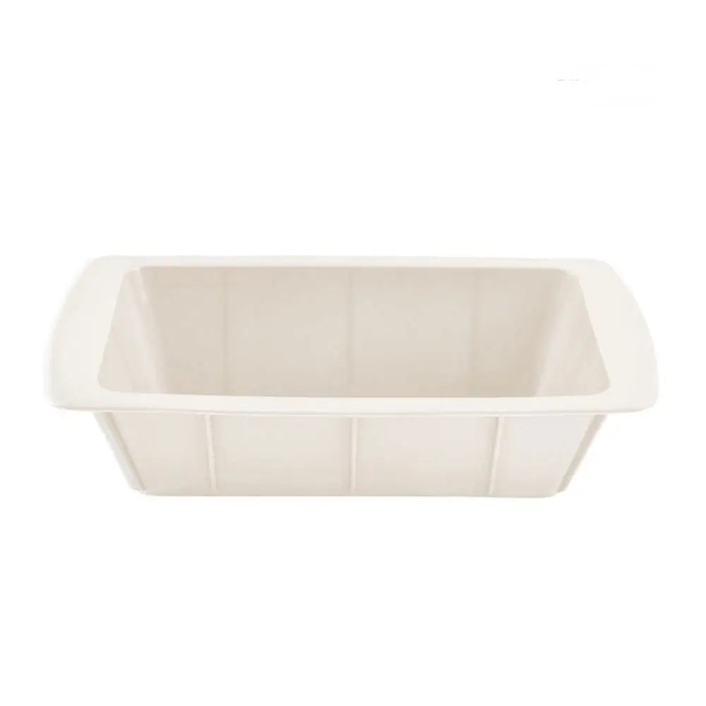 Silicone loaf pan in ivory color with a rectangular shape, deep sides, and wide handles for baking.