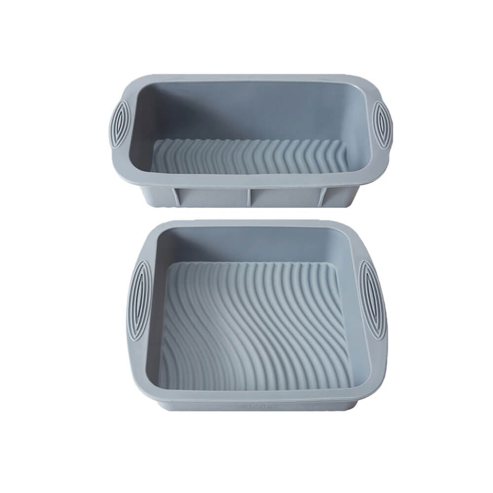 Two gray silicone baking pans: one rectangular loaf pan and one square pan with textured non-stick surfaces.