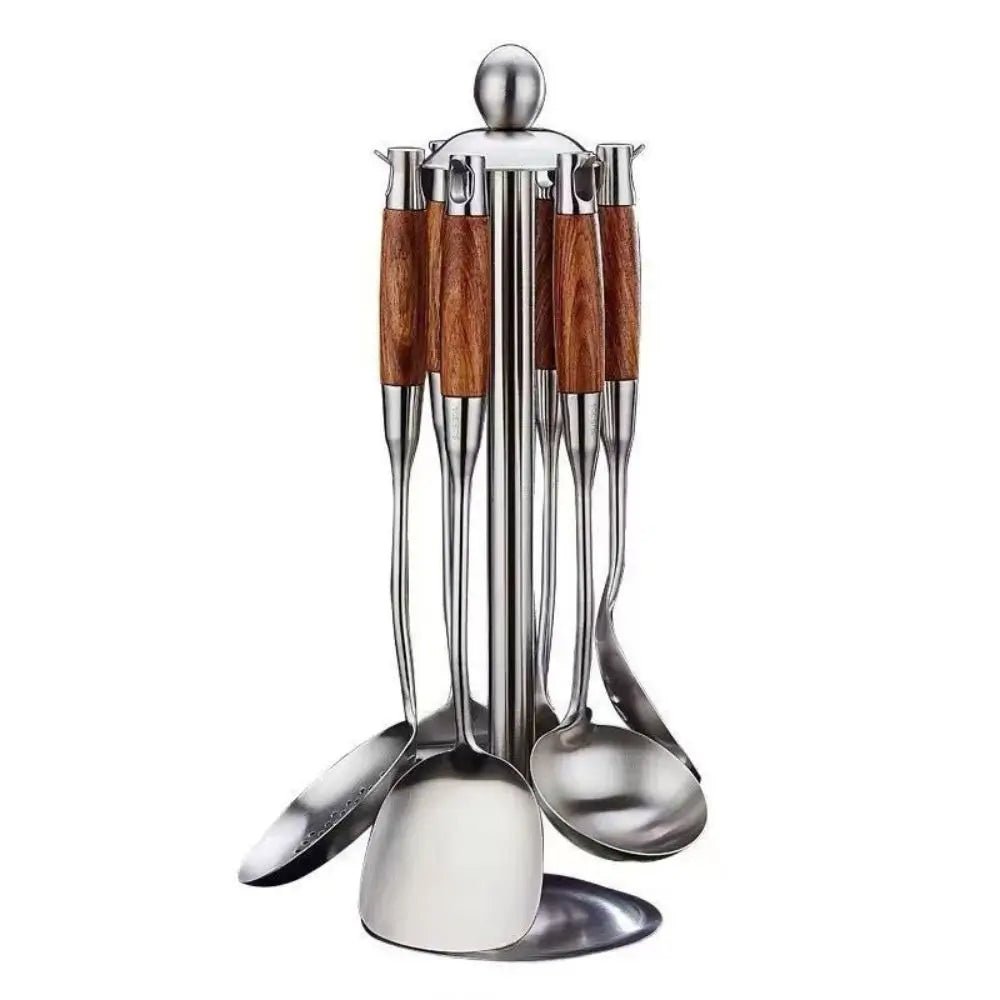 Stainless steel cooking utensils with wooden handles on a metal stand, including ladle, spatula, spoon, and skimmer.