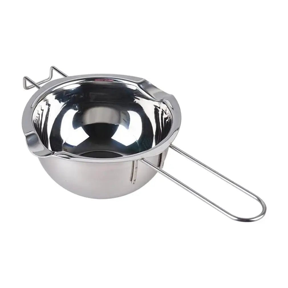 Stainless steel double boiler with handle and spout on a plain background.