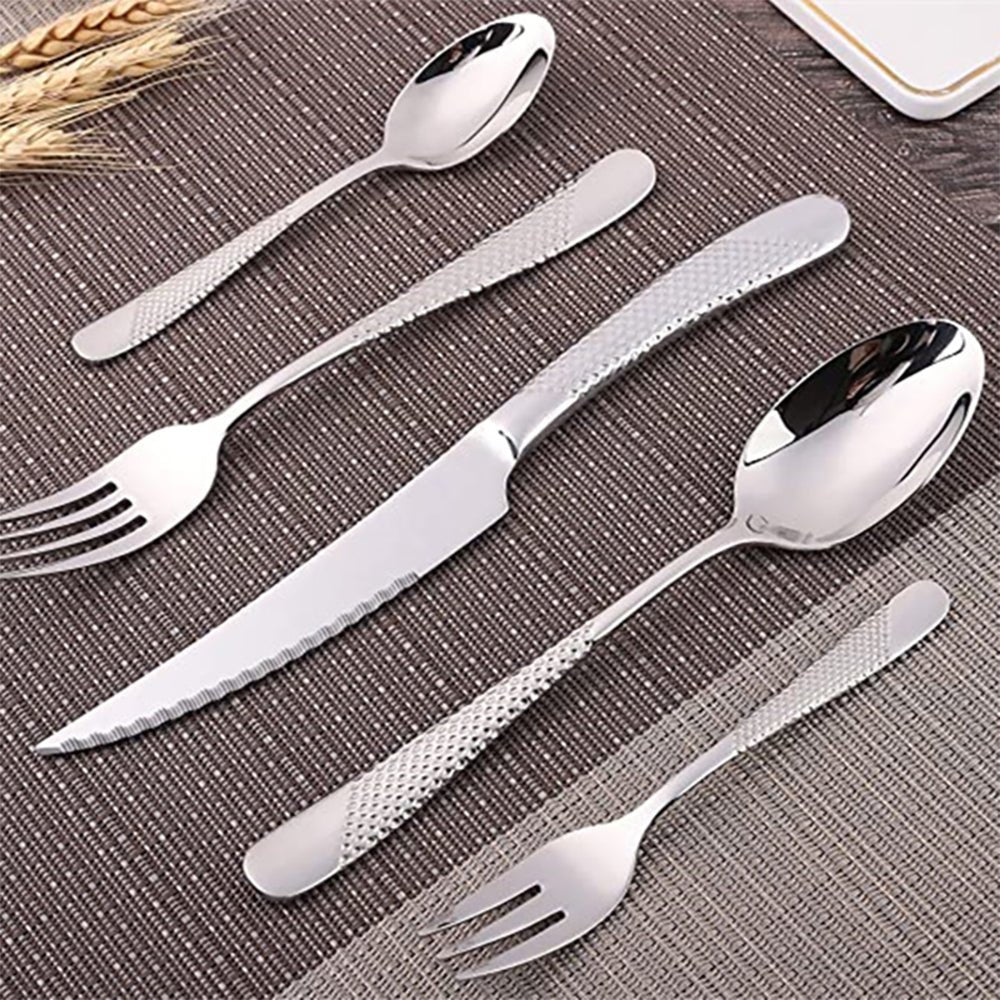 Stainless steel flatware set with a water drop-inspired pattern, polished to a mirror finish.