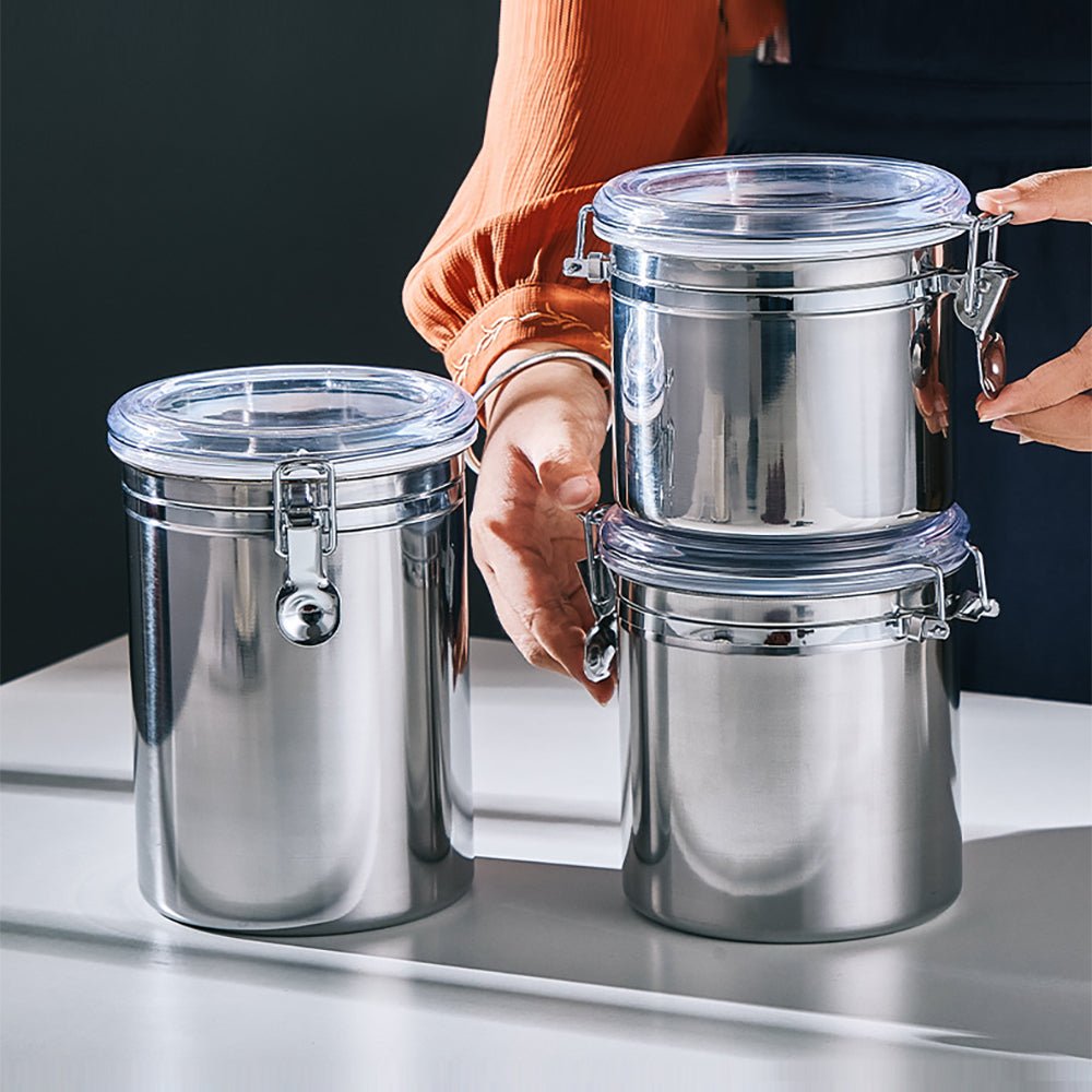 Stainless steel food storage containers with airtight seals and clear lids for easy monitoring.