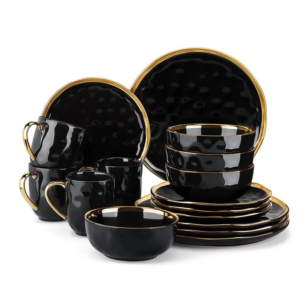 A stoneware dinnerware set featuring a glossy black finish with gold accents. The collection includes plates, bowls, and mugs, each with a textured surface. The rims of the plates and bowls, along with the handles of the mugs, are detailed with metallic gold, creating an elegant and sophisticated aesthetic. The set is stacked neatly, showcasing the design and craftsmanship.