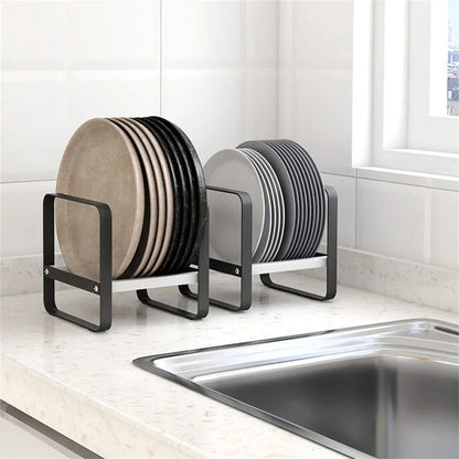 Storage dish racks hold various plate sizes to keep dishes organized and accessible in the kitchen.