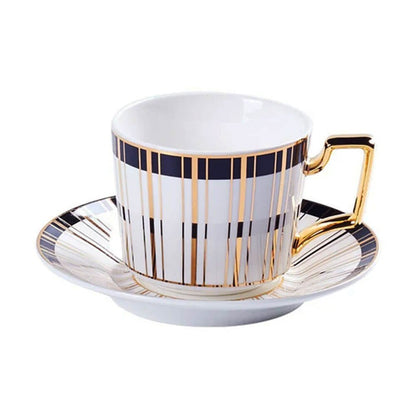 	tea cups and saucers set		tea cups and saucers set	tea-cups-and-saucers-set	&quot;
A close-up view of an elegant tea cup from a tea cups and saucers set, showcasing a luxurious design with vertical black and gold stripes on a white ceramic base.&quot;