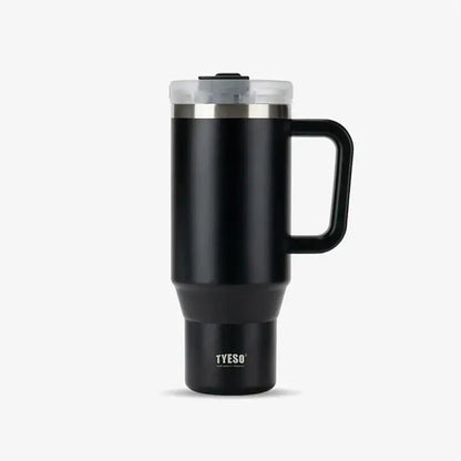 Black TYESO thermal travel mug with handle and clear lid on a plain background.