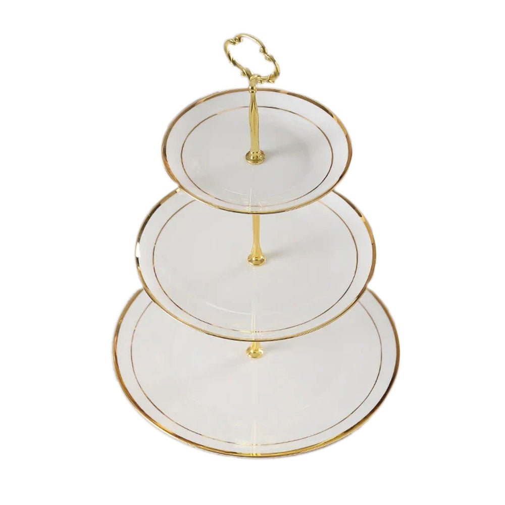 A tiered cake stand with three ceramic plates of varying sizes, featuring elegant gold detailing and a decorative handle. Perfect for showcasing cakes and desserts.