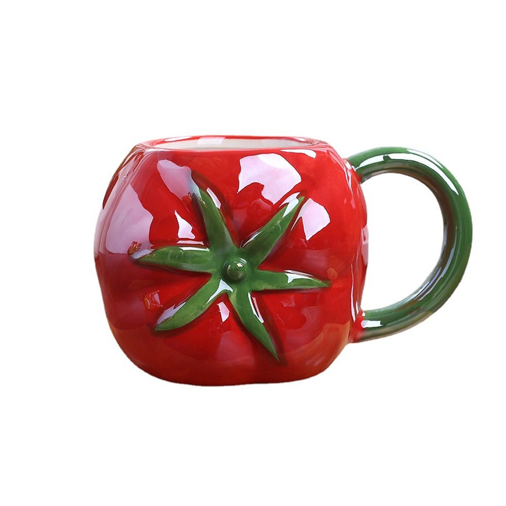 A red tomato mug with a vibrant design and ergonomic handle, crafted from premium ceramic for durability.