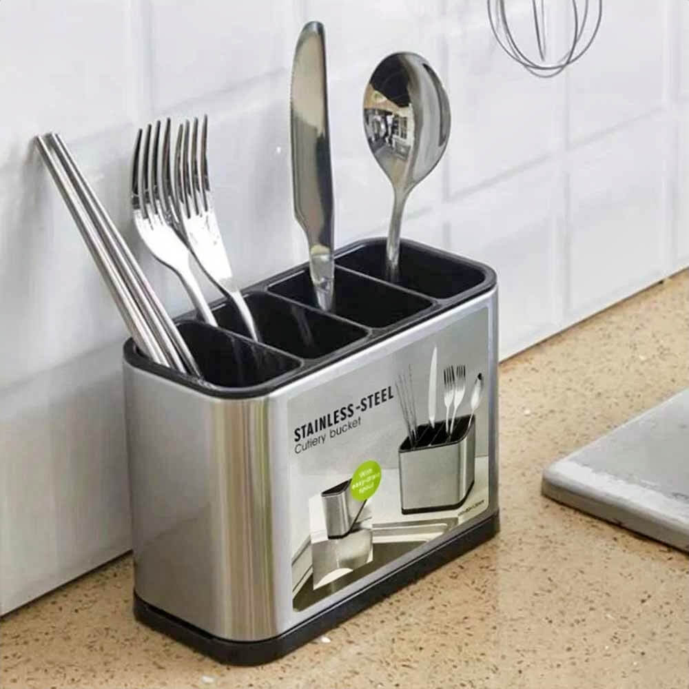 Stainless steel utensil holder for countertops with compartments organizing forks, knives, spoons, and chopsticks in kitchen.